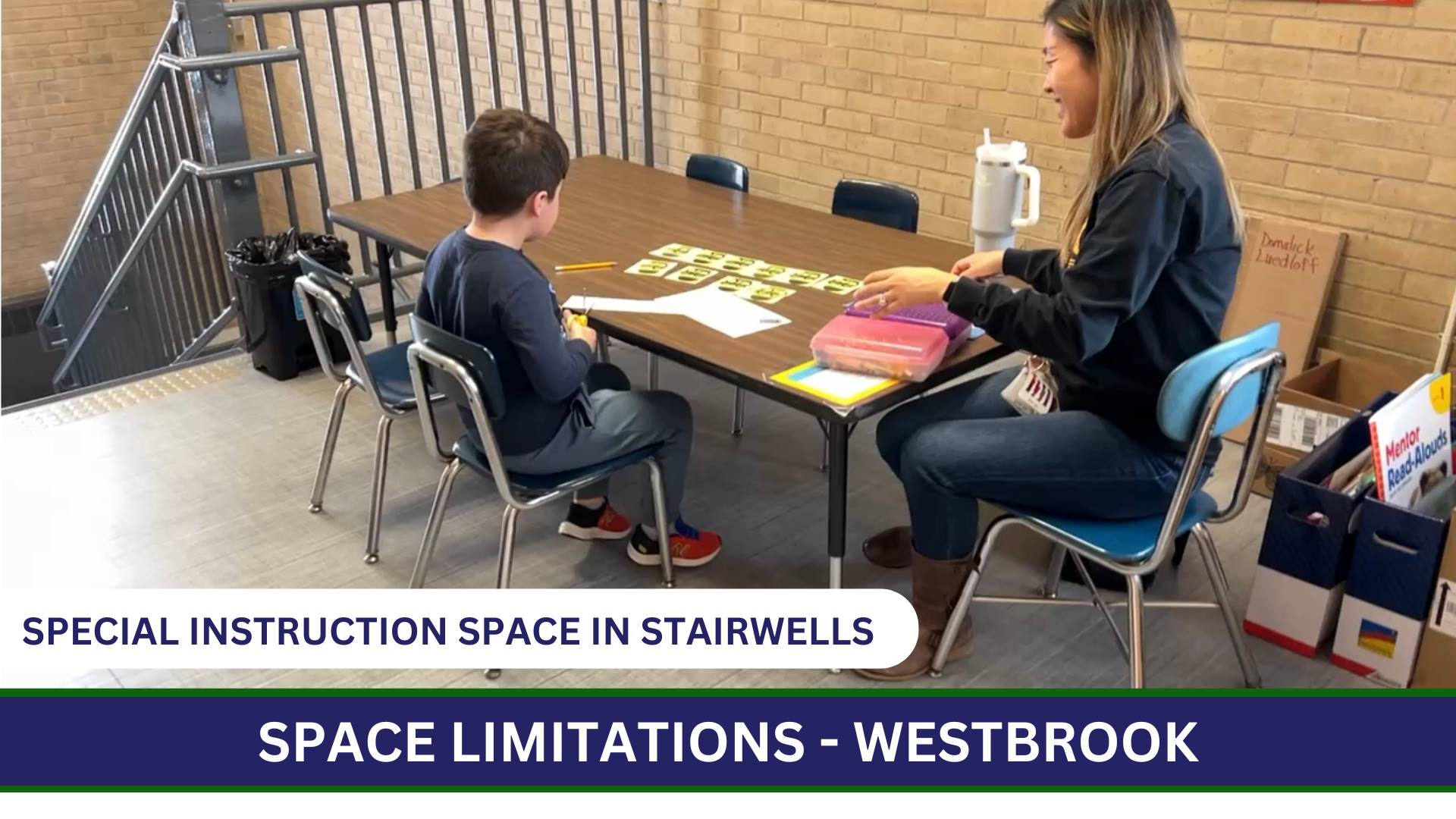 Photo of special instruction happening in a stairwell at Westbrook School for Young Learners.
